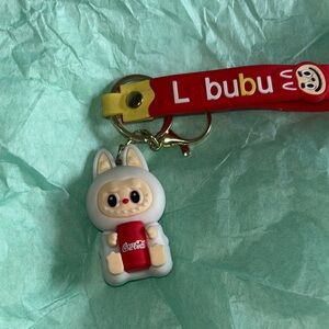 Coca-Cola Red and White Keychain with Character